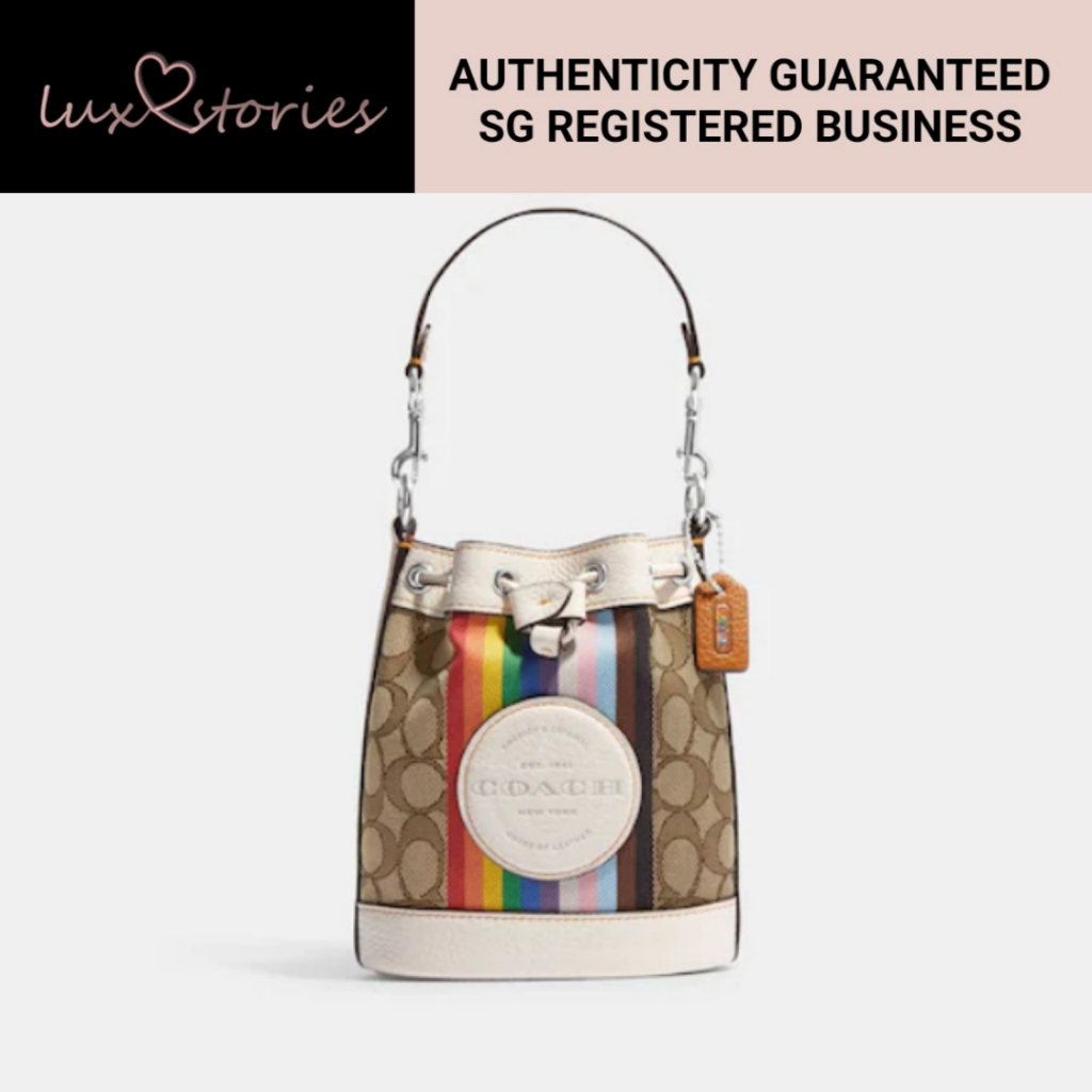 PRE-ORDER COACH Mini Dempsey Bucket Bag In Signature Jacquard With Rainbow Stripe And Coach Patch CJ661