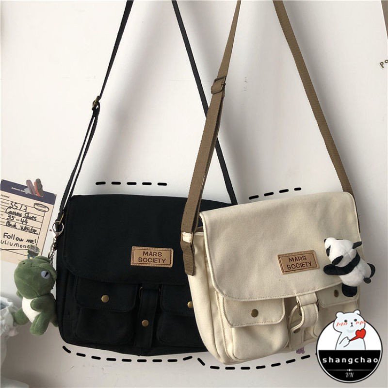 Japanese Harajuku style tooling messenger bag female Korean ins retro student canvas art college style messenger bag